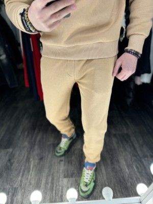 KREMINIAI SU PAŠILTINIMU SPORTINIAI KOSTIUMAI